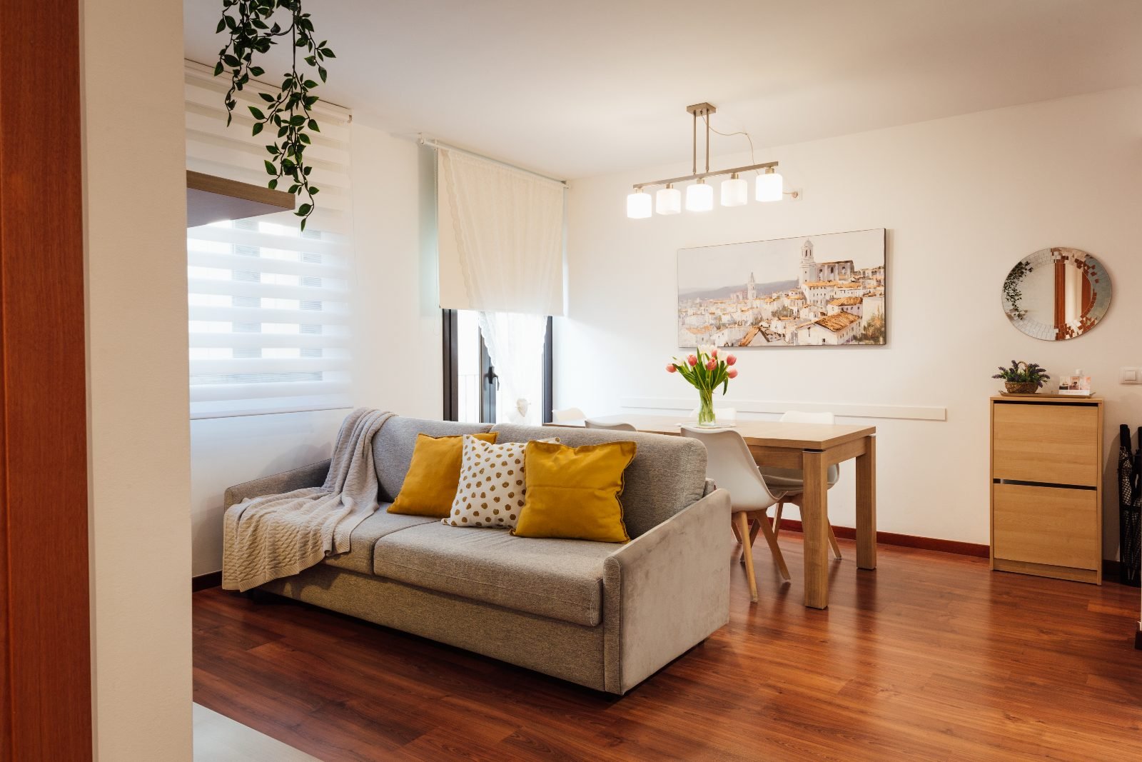 Bright living room with tulips and Girona painting